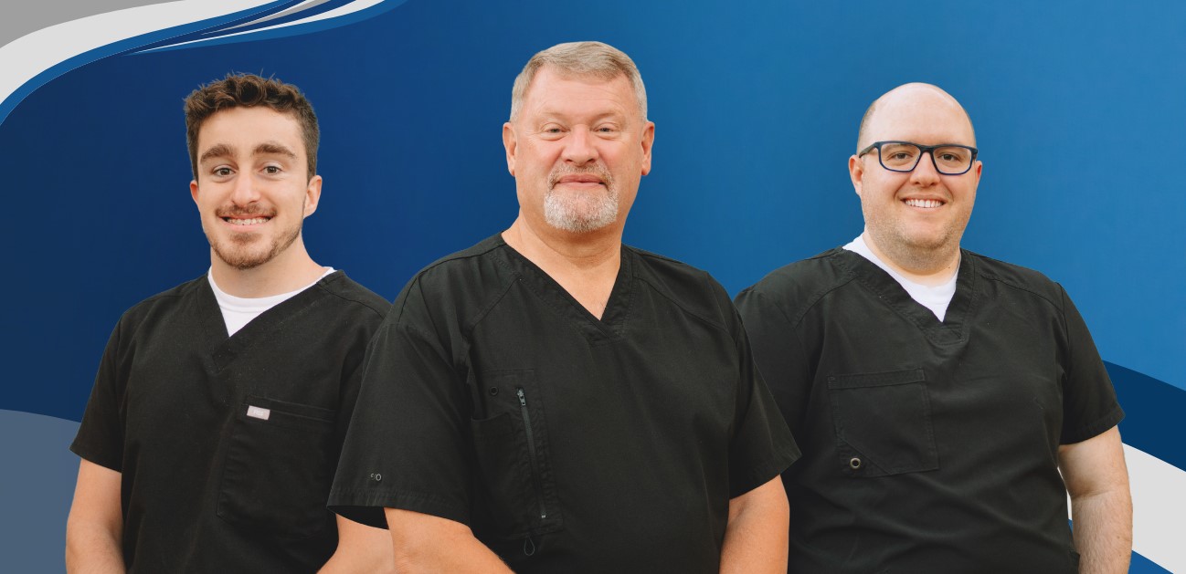 Dentist in Marion and two dental team members